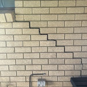 stepped wall crack